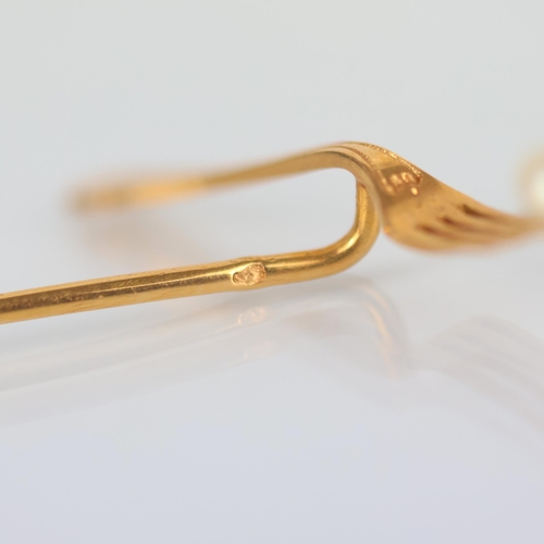 173 - A French novelty stick pin, the terminal modelled as a fork with seed pearl ‘morsel’ stamped with ea... 
