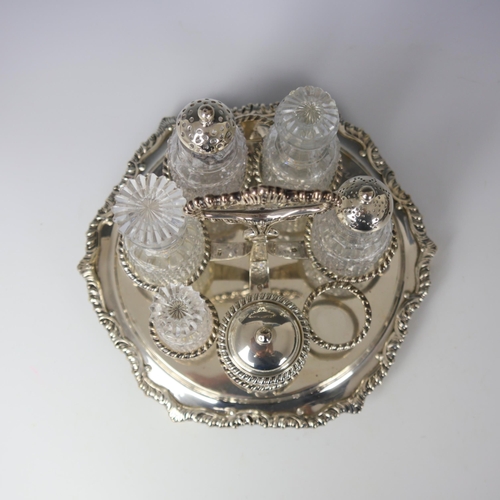 31 - A George III silver cruet stand, John and Thomas Settle, Sheffield 1814, the shaped handle with gadr... 
