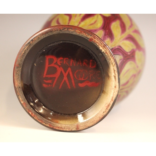 310 - Bernard Moore (British, 1850-1935), a flambe glazed art pottery vase, of inverted baluster form with... 