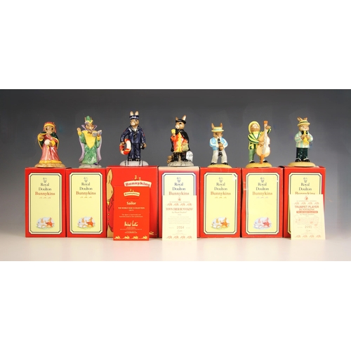 312 - Seven Royal Doulton Bunnykins Figures, comprising: a limited edition DB259 Town Crier, numbered 2054... 