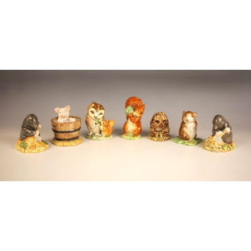313 - Seven Beswick Beatrix Potter figures, comprising: Squirrel Nutkin, Diggory Diggory Delvet (two figur... 