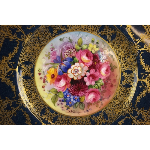 314 - A Royal Worcester cabinet plate decorated by E. Phillips, early 20th century, the well profusely han... 