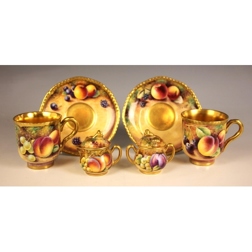 317 - Two Royal Worcester 'Fallen Fruit' coffee cups and saucers, one hand-painted by Derek Shinnie, the o... 