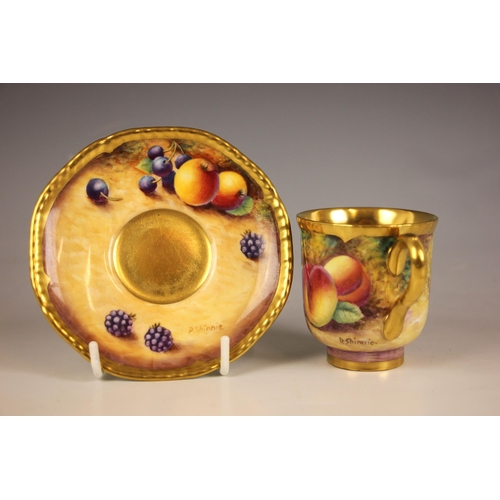 317 - Two Royal Worcester 'Fallen Fruit' coffee cups and saucers, one hand-painted by Derek Shinnie, the o... 