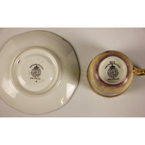 317 - Two Royal Worcester 'Fallen Fruit' coffee cups and saucers, one hand-painted by Derek Shinnie, the o... 