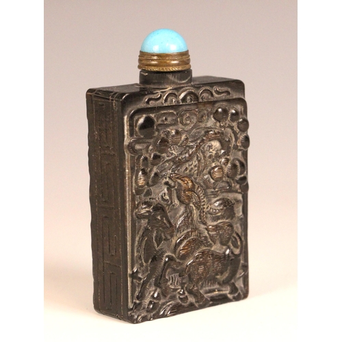 326 - A Chinese carved horn snuff bottle, early 20th century, of rectangular form and carved with deer (Lu... 