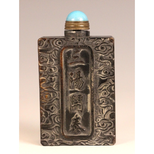 326 - A Chinese carved horn snuff bottle, early 20th century, of rectangular form and carved with deer (Lu... 