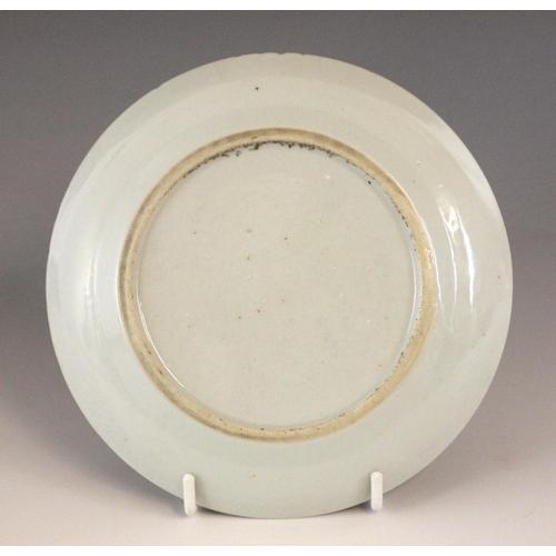 339 - A Chinese porcelain famille verte saucer dish, 18th century, the small circular dish painted to the ... 