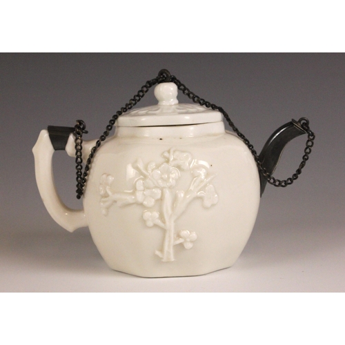 359 - A Chinese blanc de chine teapot and cover, 18th century, the globular octagonal shaped teapot with p... 