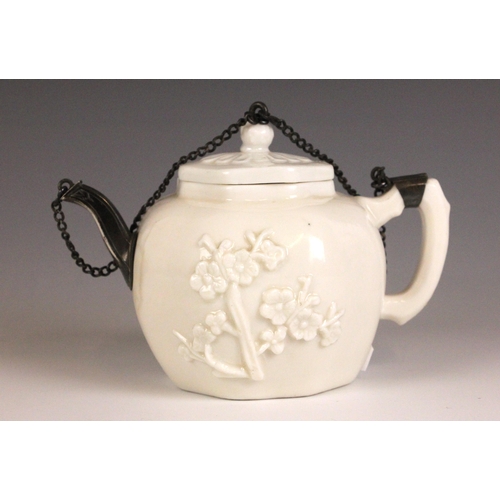 359 - A Chinese blanc de chine teapot and cover, 18th century, the globular octagonal shaped teapot with p... 