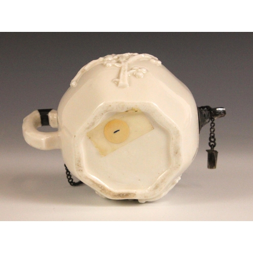 359 - A Chinese blanc de chine teapot and cover, 18th century, the globular octagonal shaped teapot with p... 