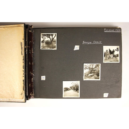 387 - A collection of approximately sixty black and white photographs depicting Penang and Singapore in 19... 