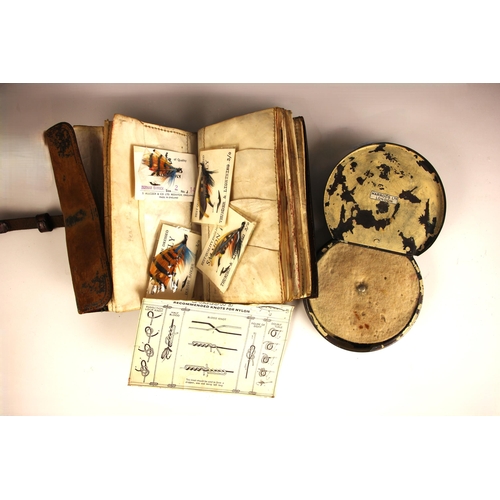 392 - A Farlows pig skin leather fishing wallet, early 20th century, containing fifteen fishing flies, som... 