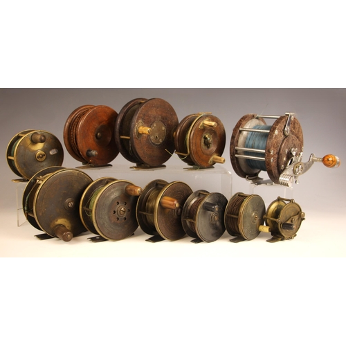 393 - Eleven vintage fishing reels, to include an 11cm diameter reel by J. Bernard & Son, a 9cm diameter r... 