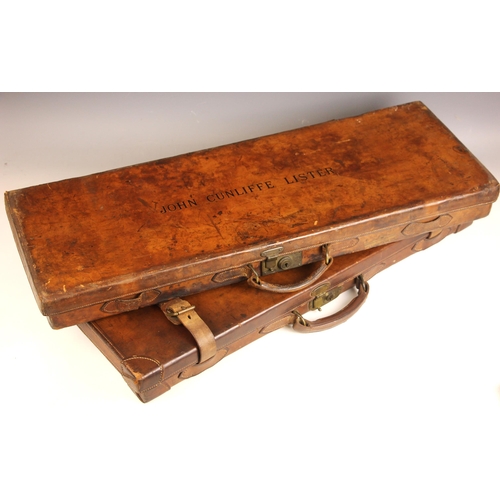 394 - A shotgun case by Charles Lancaster of London, 19th century, the wooden framed leather bound case wi... 