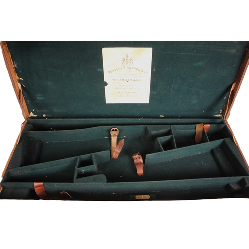 394 - A shotgun case by Charles Lancaster of London, 19th century, the wooden framed leather bound case wi... 