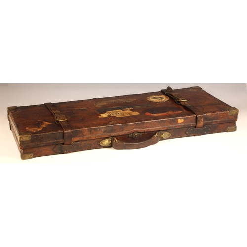 395 - A shotgun case by Joseph Lang and Son, early 20th century, the wooden framed leather and brass bound... 