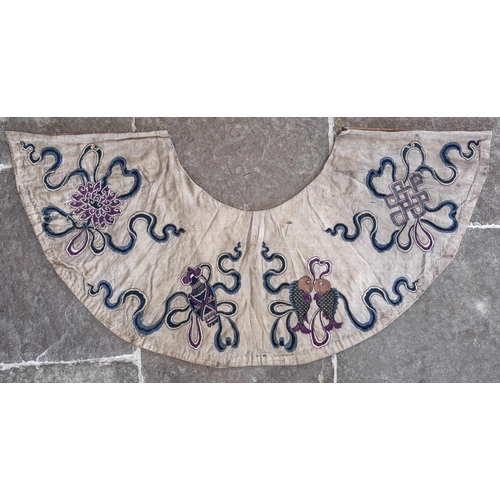 414 - A Chinese silk embroidered cloud collar (Yunjian) 19th century, of typical form embroidered with aus... 