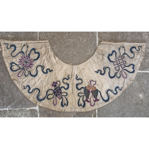 414 - A Chinese silk embroidered cloud collar (Yunjian) 19th century, of typical form embroidered with aus... 