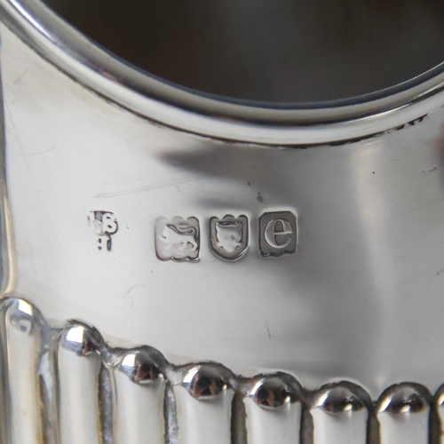 46 - An early 20th century silver tea service, Charles Stuart Harris, London 1900/1901, comprising teapot... 