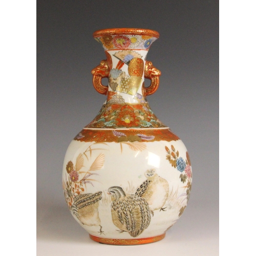 353 - A Japanese porcelain Kutani vase, Meiji Period (1868-1912), the bottle shaped vase with two zoomorph... 