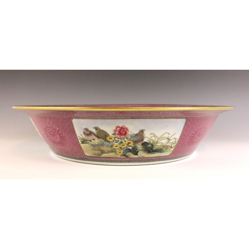 327 - A large Chinese porcelain famille rose centre bowl, Qianlong seal mark, of circular form and central... 