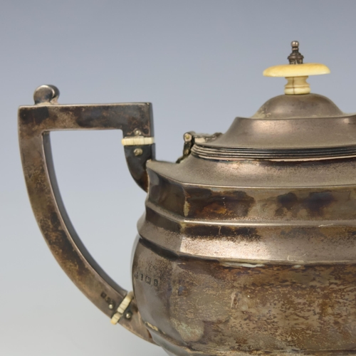 54 - A George V silver teapot, S Blanckensee & Son Ltd, Birmingham 1917, the grooved cover above a hexago... 