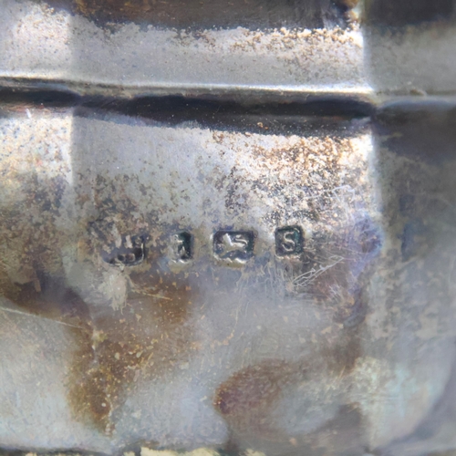 54 - A George V silver teapot, S Blanckensee & Son Ltd, Birmingham 1917, the grooved cover above a hexago... 