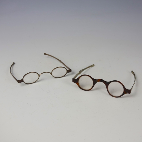 56 - A pair of 19th century silver framed spectacles, stamped possibly 'JWH' London, of typical form with... 