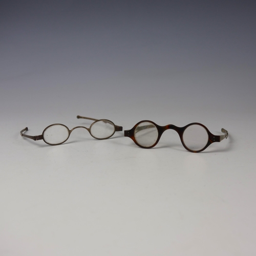 56 - A pair of 19th century silver framed spectacles, stamped possibly 'JWH' London, of typical form with... 
