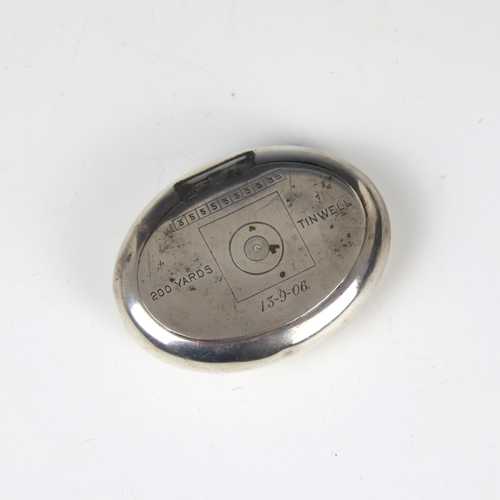 57 - An Edwardian silver tobacco box, William M Hayes, Birmingham 1903, of oval form with engraving for t... 