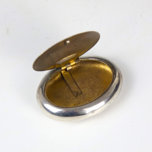 57 - An Edwardian silver tobacco box, William M Hayes, Birmingham 1903, of oval form with engraving for t... 