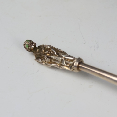 64 - A 19th century style white metal apostle spoon, the cast terminal leading to fig shaped bowl with tw... 