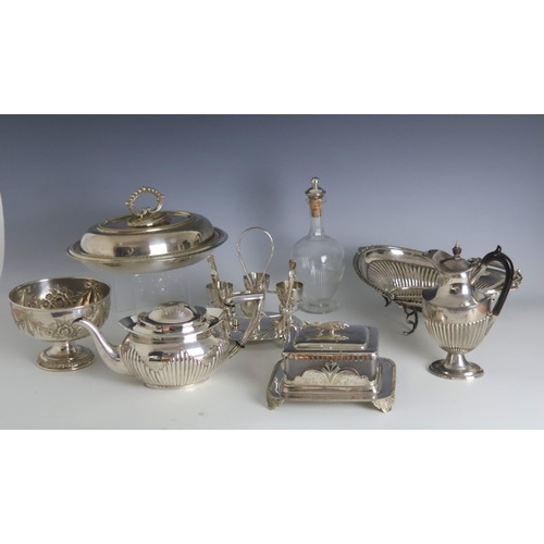 77 - A selection of silver plate, including a sardine dish, of square form with cast sardine shaped handl... 