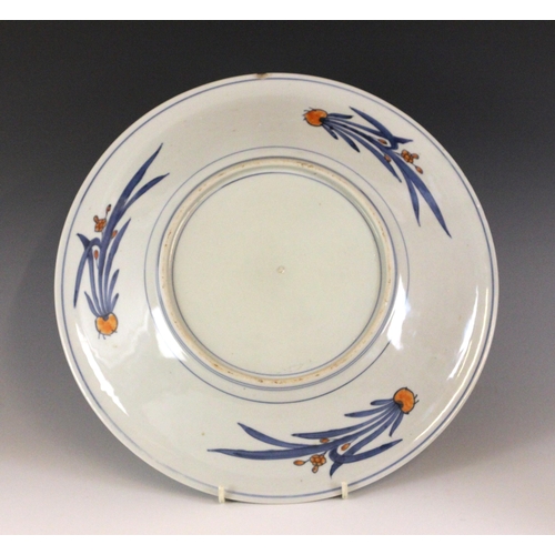 346 - A pair of Japanese porcelain chargers, Meiji Period (1868-1912), each of circular form and polychrom... 