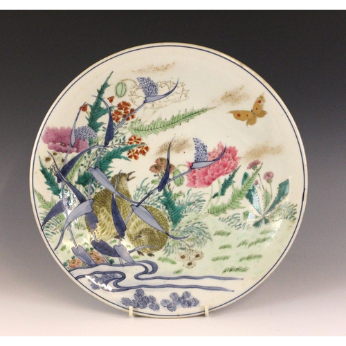 346 - A pair of Japanese porcelain chargers, Meiji Period (1868-1912), each of circular form and polychrom... 