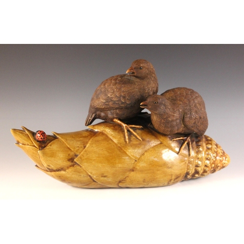347 - A large Japanese porcelain model of two quail on a bamboo root, 19th century, each bird modelled per... 