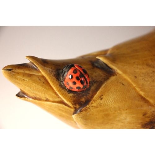 347 - A large Japanese porcelain model of two quail on a bamboo root, 19th century, each bird modelled per... 