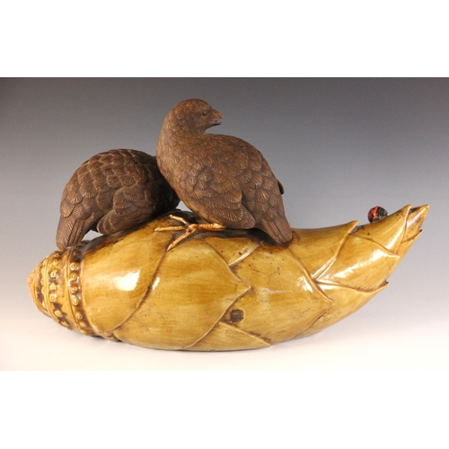 347 - A large Japanese porcelain model of two quail on a bamboo root, 19th century, each bird modelled per... 