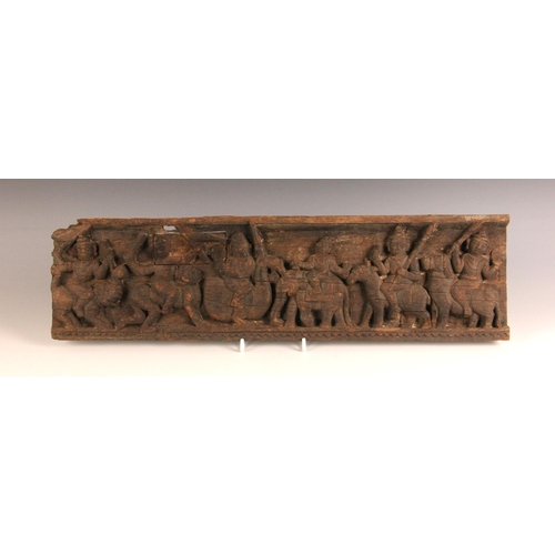 320 - A collection of Indian and South East Asian carvings, 20th century, to include an elephant, a horse,... 