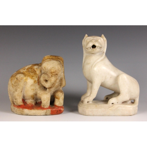 322 - A carved marble and gilt painted model of a mythical beast, India, 19th century, modelled seated on ... 