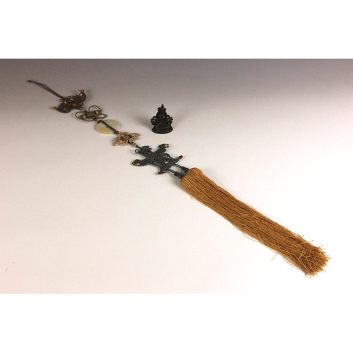 323 - A Chinese silk scroll pendant or tassel, late 19th century, woven to depict a bat and butterfly susp... 