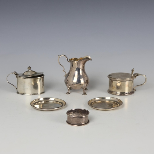 65 - A selection of silver, including an Edwardian silver cream jug, Martin Hall and Co, Sheffield 1906, ... 