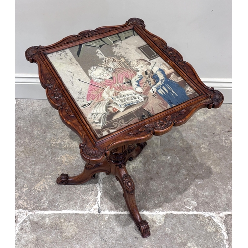 565 - A 19th century and later Italian walnut occasional table, the rectangular carved top inset with a ta... 