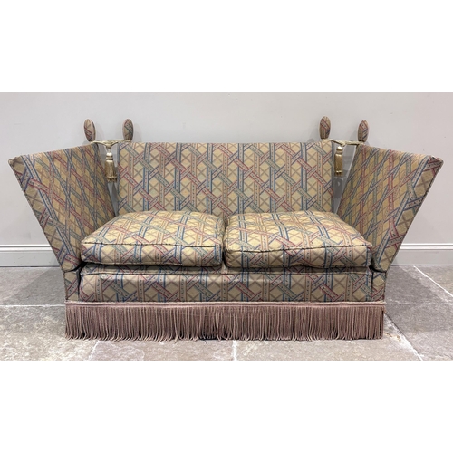 585 - An Edwardian Knole type sofa, upholstered throughout in a lattice design fabric, with standard drop ... 
