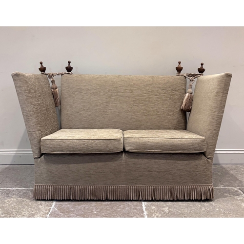 586 - A Knole type sofa, upholstered throughout in a sand coloured chenille fabric, with standard drop end... 