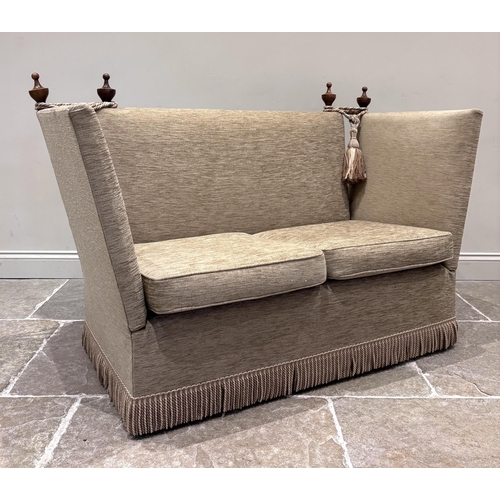586 - A Knole type sofa, upholstered throughout in a sand coloured chenille fabric, with standard drop end... 