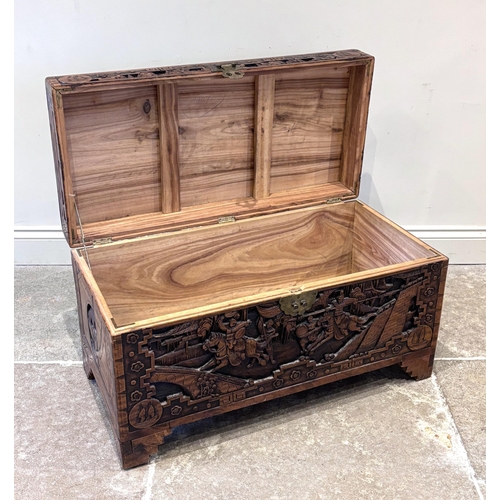 590 - An early 20th century Chinese carved hardwood blanket box, of rectangular form, carved in relief to ... 