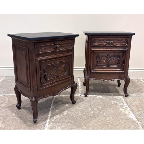 592 - A pair of Louis XVI style bedside cabinets, 20th century, each with polished slate top above a singl... 