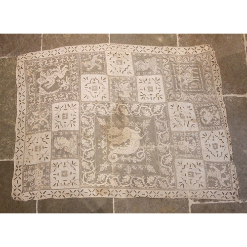 401 - An early 19th century English needlework tapestry panel, the square panel worked with a busy geometr... 